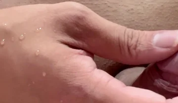 The Glans Penis Covered with Enoki Mushrooms