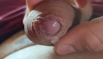 Close-up of Glans Ejaculating Intensely Before Cumming.