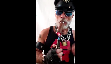 Leather Stepdad Lighting a Big Ring